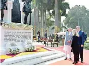  ?? PIC/PTI ?? PM Narendra Modi, Israeli PM Benjamin Netanyahu and his wife Sara at the newly renamed Teen Murti-haifa Chowk on Sunday