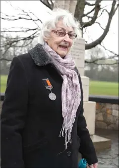  ??  ?? Deirdre Spillane wears the medal of her uncle Patrick Tierney