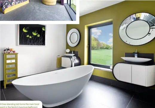  ??  ?? A free-standing tub forms the main focal point in the family’s luxurious bathroom