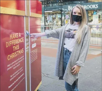  ??  ?? DONATION
Natasha Stride at Whiteley shopping centre