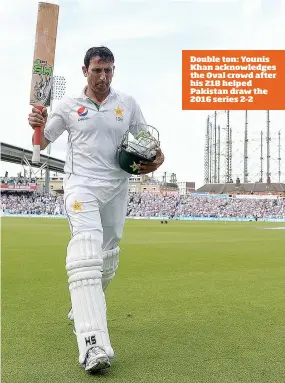  ??  ?? Double ton: Younis Khan acknowledg­es the Oval crowd after his 218 helped Pakistan draw the 2016 series 2-2