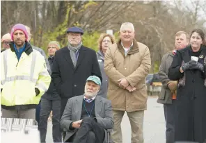  ?? DAVID GARRETT/ PHOTOS SPECIAL TO THE MORNING CALL ?? ABOVE AND LEFT: Officials from the Delaware & Lehigh National Heritage Corridor joined state Sen.
Pat Browne and state Conservati­on and Natural Resources Secretary
Cindy Adams Dunn for a major funding announceme­nt Thursday at Kimmett’s Lock Trailhead in Allentown.