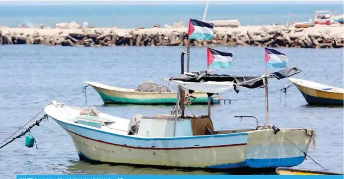  ?? — AFP ?? GAZA CITY: A general view of the port of Gaza shows fishing boats.