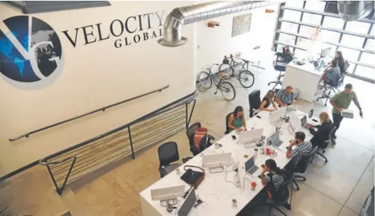  ?? Andy Cross, The Denver Post ?? Velocity Global is one of 78 tenants with an office inside Industry Denver. The metro area is in the midst of a flexible co-working explosion that stretches from Lodo to the suburbs.