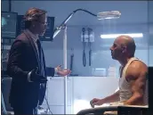  ?? SONY — COLUMBIA PICTURES ?? Guy Pearce, left, and Vin Diesel in “Bloodshot,” which brought in just $9.3million in weekend ticket sales.