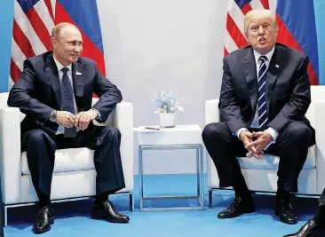  ?? [AP PHOTO] ?? President Donald Trump speaks during a meeting Friday with Russian President Vladimir Putin at the G20 Summit in Hamburg.