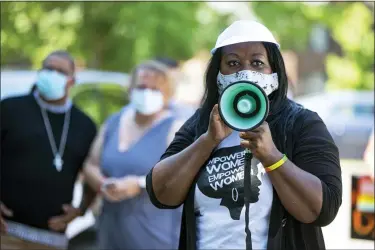  ?? MICHAEL CONROY — THE ASSOCIATED PRESS ?? In this Friday, June 19, 2020, photo Jeannine Lee Lake, Democratic candidate for Indiana’s 6th congressio­nal district, speaks to the crowd gathered for Juneteenth day event in Columbus, Ind.