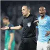  ?? PHOTO: GETTY IMAGES ?? Match referee Cuneyt Cakir signals offside after a VAR decision in the UEFA Champions League quarterfin­al second leg match between Manchester City and Tottenham Hotspur at Etihad Stadium in Manchester.