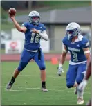  ?? ♦ Hassan Niblet ?? Gordon Central quarterbac­k
Peyton Chastain fires a pass during the Warriors’ 26-8 victory over Utopian
Academy Monday night in the Warriors’
annual spring game at Ratner
Stadium.