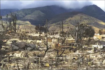  ?? JAE C. HONG/AP ?? A GENERAL VIEW shows the aftermath of a wildfire in Lahaina, Hawaii, on Aug. 21.