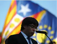  ?? (Ivan Alvarado/Reuters) ?? CATALAN PRESIDENT Carles Puigdemont delivers a speech at the memorial of ‘Fossar de la Pedrera’ (Pedrera mass grave) in Barcelona yesterday.