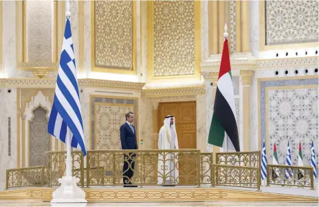  ?? Hamad Al Kaabi / Ministry of Presidenti­al Affairs ?? Sheikh Mohamed bin Zayed, Crown Prince of Abu Dhabi and Deputy Supreme Commander of the Armed Forces, and Greek Prime Minister Kyriakos Mitsotakis at an official reception at Qasr Al Watan yesterday