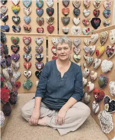  ??  ?? Helen Birmingham with her Sawdust Hearts project.