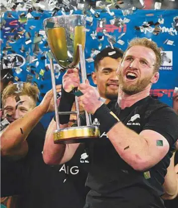 ?? AFP ?? New Zealand’s Kieran Read holds the trophy after the All Blacks won the 2017 edition of the Rugby Championsh­ip with their victory over Argentina in Buenos Aires on Saturday.