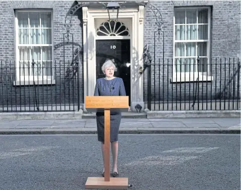  ?? REUTERS ?? Britain’s Prime Minister Theresa May speaks to the media outside 10 Downing Street, in central London yesterday. She called for an early election on June 8.