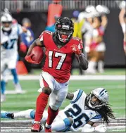 ?? HYOSUB SHIN / HYOSUB.SHIN@AJC.COM ?? Against the Panthers, receiver Olamide Zaccheaus caught a 93-yard touchdown pass on his first catch in the league. The speedy undrafted player from Virginia will get some more opportunit­ies due to injuries.