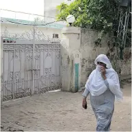  ?? B.K. BANGASH / THE ASSOCIATED PRESS ?? The front gate of the childhood home of London Bridge attack suspect Khuram Butt, in Jhelum, Pakistan.