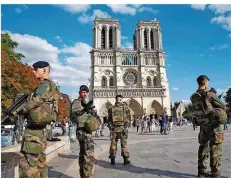  ?? FOTO: VAN DER HASSELT/AFP ?? Das Militär in den Straßen von Paris: Ein gewohnter Anblick für die Franzosen, die seit Jahren im Fokus radikaler Islamisten stehen.