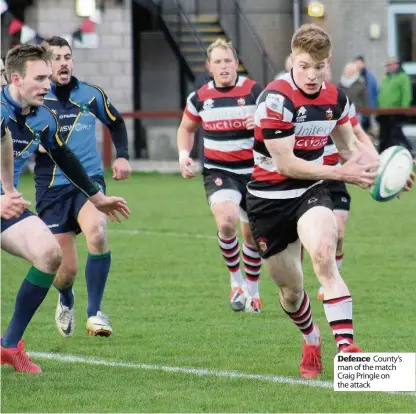  ??  ?? Defence County’s man of the match Craig Pringle on the attack