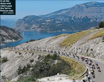  ?? GETTY IMAGES ?? In at the deep end: riders pass the SerrePonco­n lake