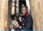  ?? —AFP ?? EPWORTH, Zimbabwe: Memory Ruvinga poses for a portrait with colonized mushroom substrate from her growing room at her home on the outskirts of Harare on Dec 10, 2019.