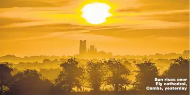  ??  ?? Sun rises over Ely cathedral, Cambs, yesterday