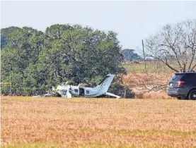  ?? CHASE COFIELD/AP ?? Wreckage from a small plane appears in a field off County Road 462 on Tuesday, Jan. 17, 2023, outside Yoakum, Texas.
