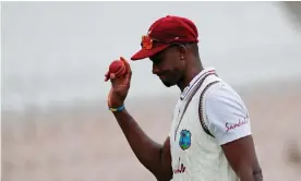  ??  ?? Jason Holder leaves the field with the ball after taking six wickets Photograph: Adrian Dennis/AFP/Getty Images