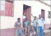  ?? ?? Lubulini Inner Council Member Jaha Vilane pictured standing next to the newly-built two-room house with the Zulu family.