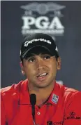  ?? SCOTT HALLERAN/ GETTY IMAGES) ?? Jason Day speaks to reporters on Wednesday.