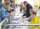  ?? PHOTO: PATRICK BROWNE ?? Totting up: The by-election count centre, in Wexford Town.