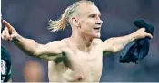  ??  ?? Croatia’s Domagoj Vida celebrates scoring against Russia and later featured on a video provocativ­ely declaring ‘Glory to Ukraine’