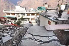  ?? Reuters ?? ■ Besides hotels and business establishm­ents, 678 homes are in danger in Joshmath, the Uttarakhan­d government said.