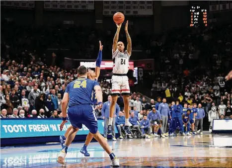  ?? Jessica Hill/Associated Press ?? UConn’s Jordan Hawkins (24) shoots against Xavier in Storrs last week.