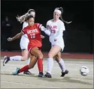  ?? AUSTIN HERTZOG — DIGITAL FIRST MEDIA ?? Neshaminy’s Michaela Boyd (10) tries to get past Owen J. Roberts’ defender Kylie Cahill (29).