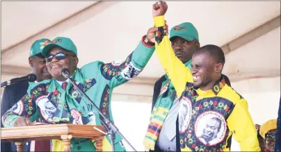  ??  ?? Vice President Chiwenga introduces ZANU-PF parliament­ary candidate for Budiriro Cde Godwin Gomwe at a rally held at Budiriro 2 High School in Harare yesterday. (Picture by Munyaradzi Chamalimba)