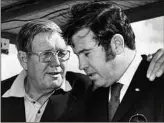  ?? / Associated Press ?? Bill France Sr., left, with son Bill France Jr., helped form NASCAR. Over 75 years it has grown into the most popular form of racing in the U.S.