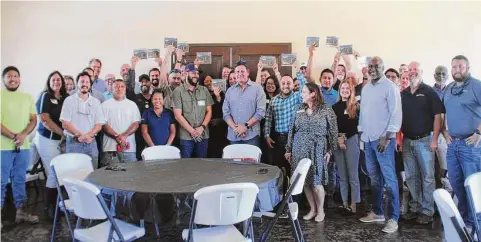  ?? Courtesy of GHBA ?? Taylor Morrison Homes’ vendors, suppliers and trades join Taylor Morrison staff, GHBA leadership, and the two charities that benefit from the Benefit Homes Project at a recent Vendor Appreciati­on Luncheon held at the Grand Vista Recreation and Pool Center.