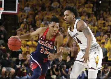  ?? ASSOCIATED PRESS ?? ARIZONA GUARD ALLONZO TRIER (35) in the second half during Thursday’s game against Arizona State in Tempe.