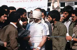  ?? GETTY ?? A man is taken hostage in Tehran in November 1979