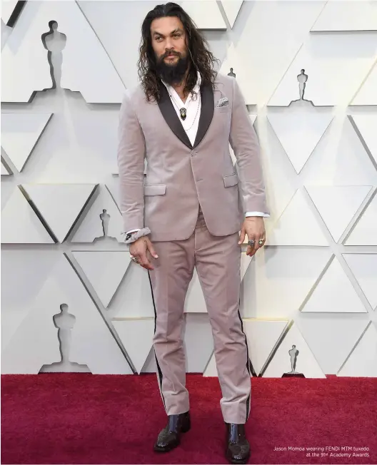  ??  ?? Jason Momoa wearing FEnDI MTM tuxedo at the 91st academy awards