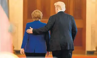  ?? MANDEL NGAN/AFP ?? Protocolar. Angela Merkel (E) e Donald Trump (D) se encontrara­m na Casa Branca