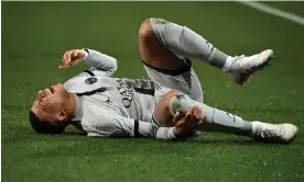  ?? Photograph: Sylvain Thomas/AFP/Getty Images ?? Kylian Mbappé’s injury is a worry for PSG, who play Bayern Munich in the Champions League in less than two weeks.