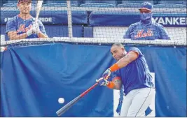  ?? Kathy Willens The Associated Press ?? The Mets’ Yoenis Céspedes gets in his BP cuts Sunday before playing the Yankees.