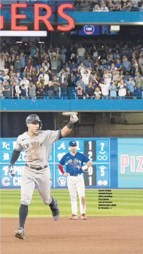 ?? AP ?? Aaron Judge rounds bases after clouting 61st home run of season Wednesday night in Toronto.