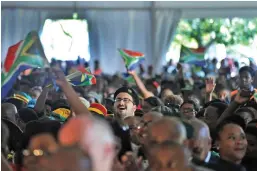  ?? /Bongiwe Mchunu ?? South Africans from all walks of life celebrate Freedom Day at the Unions Buildings. The writer says our democracy should be defended at all costs.