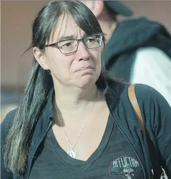  ?? ARLEN REDEKOP ?? Denise Handry, seen at Vancouver Internatio­nal Airport after flying in from Las Vegas on Monday, says she is grateful just “to be back in Canada” after the experience of Sunday night’s shooting.