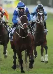  ??  ?? Hugh Bowman steers Winx home