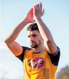  ?? ?? Josh Jackman applauds the crowd after Saturday's 1-1 draw to Eastbourne Borough. Photos: George Beck.