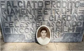  ?? Photograph: Lorenzo Tondo/The Guardian ?? A picture of Lucia Mantione by her tombstone in Montedoro’s cemetery.
